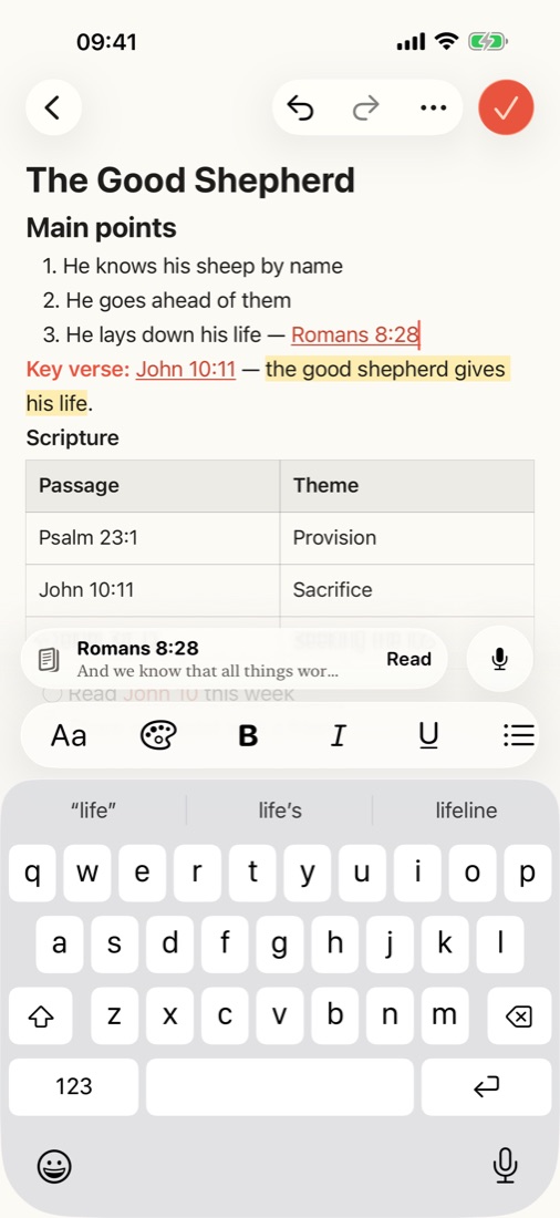 A note with Romans 8:28 linked and its verse shown above the keyboard
